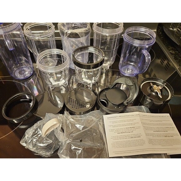 Lot Of 16 Pieces Nutribullet Assorted Cups & Lids / Tops + 1 Blade (Untested) - Picture 3 of 12